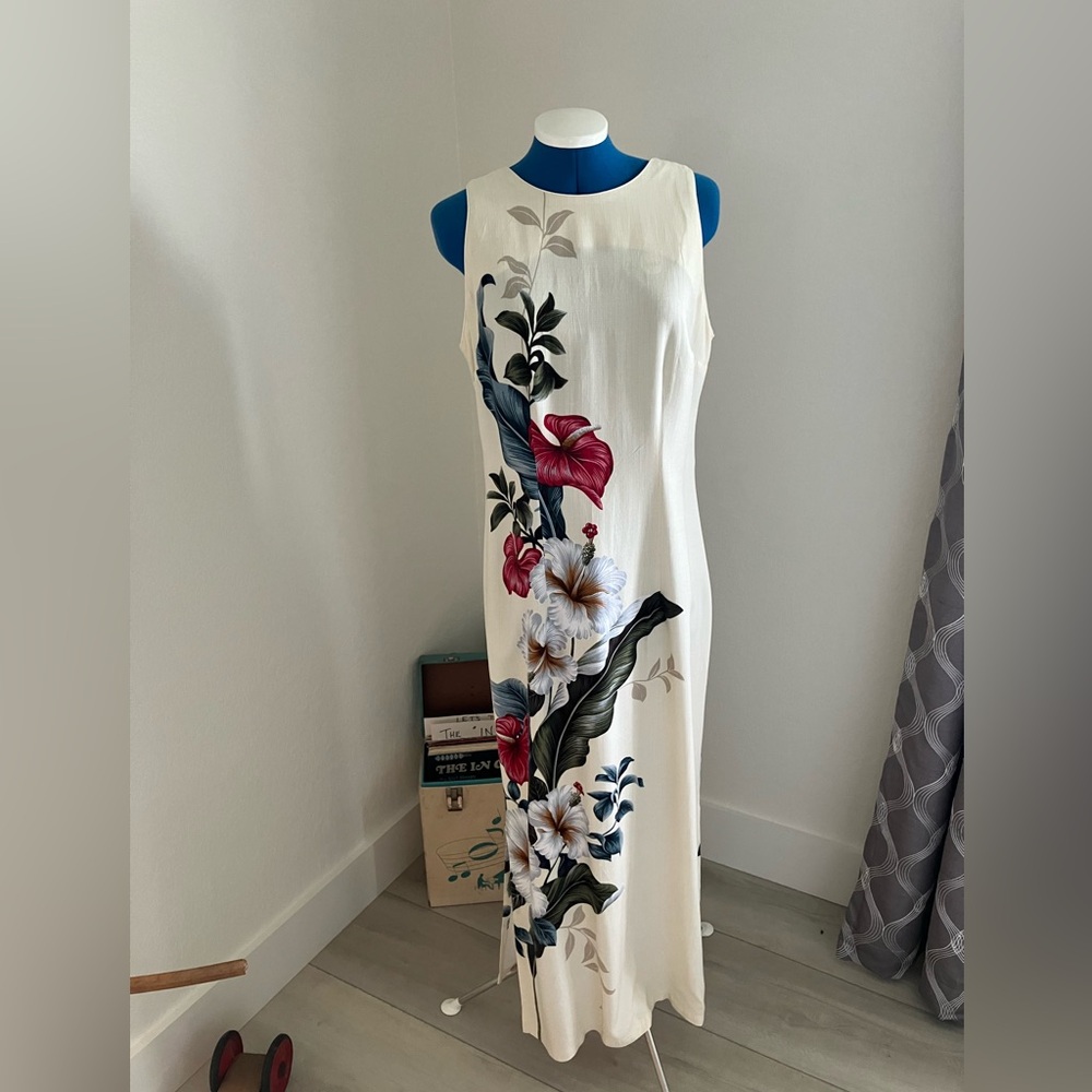 Vintage Iolana Classic.  Multi colored flower print on cream background.